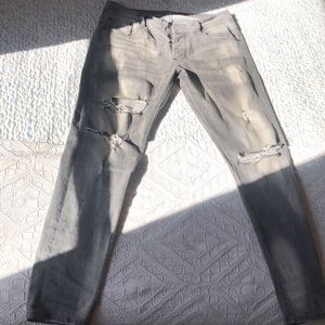 Grey ripped jeans